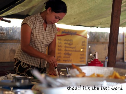 beautiful lady selling delicious burmese styled fried tofu