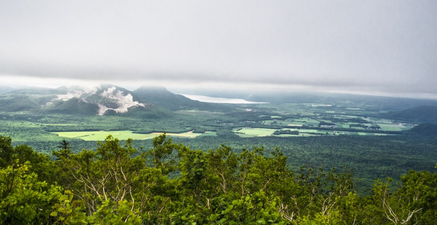 smoking mountain in the distance