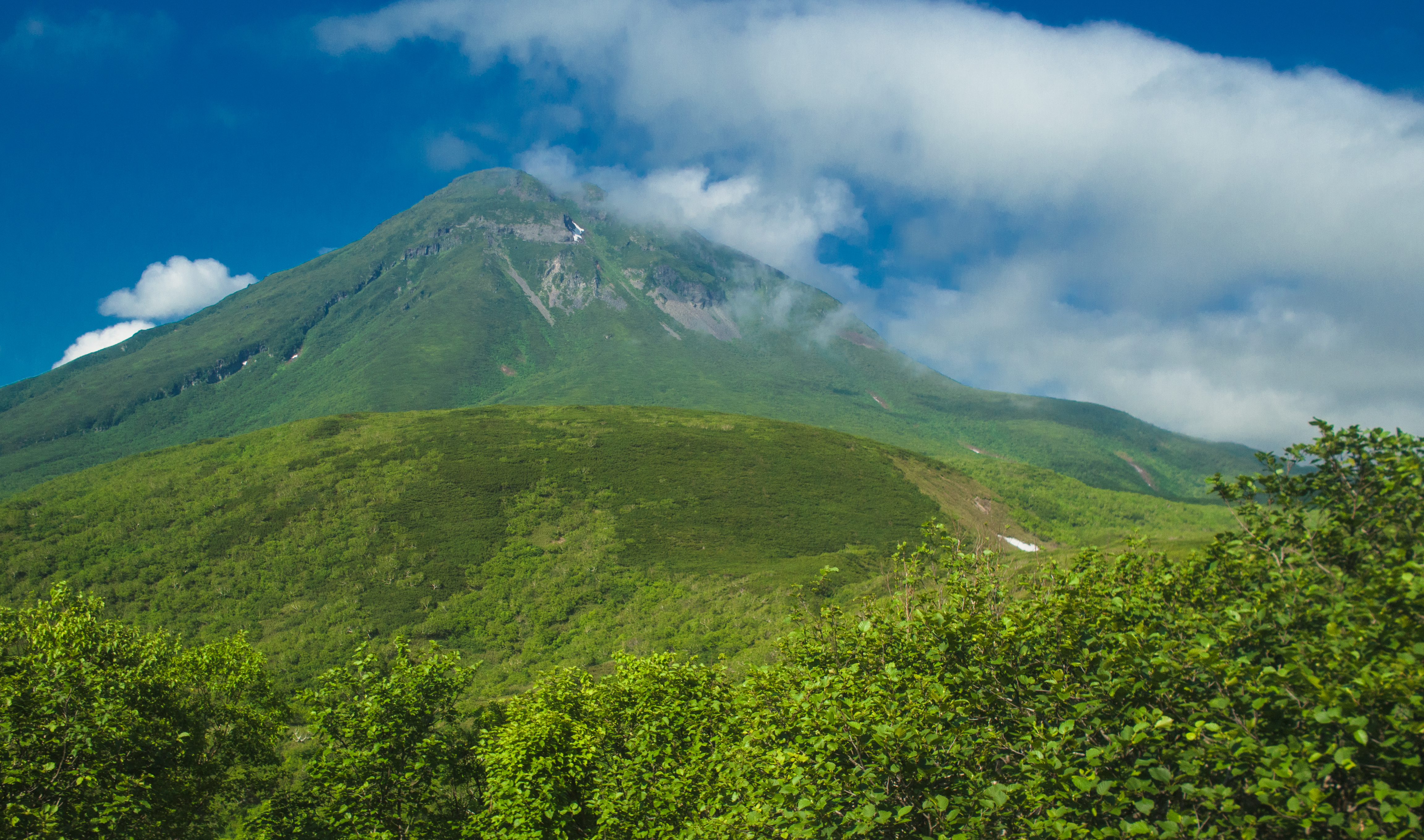 mount rausu looms into view